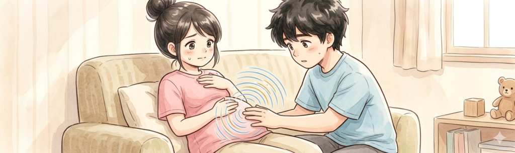 妊婦がおなかの中の赤ちゃんがぴくぴくと一定間隔で動いているので心配している
